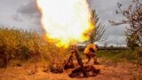 A Ukrainian-manufactured MP-120 mortar is fired at the enemy near Kharkiv on May 9.