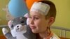 GRAB Ukrainian 9-Year-Old Making 'Miracle' Recovery From Shrapnel Head Wound