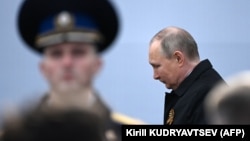 Russian President Vladimir Putin arrives to watch the Victory Day military parade in Red Square in central Moscow on May 9.