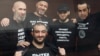 The five activists pose for a photo in court in Rostov-on-Don on May 12.