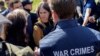 German Foreign Minister Annalena Baerbock visits a church where a mass grave was found after Russian forces retreated from Bucha on May 10.