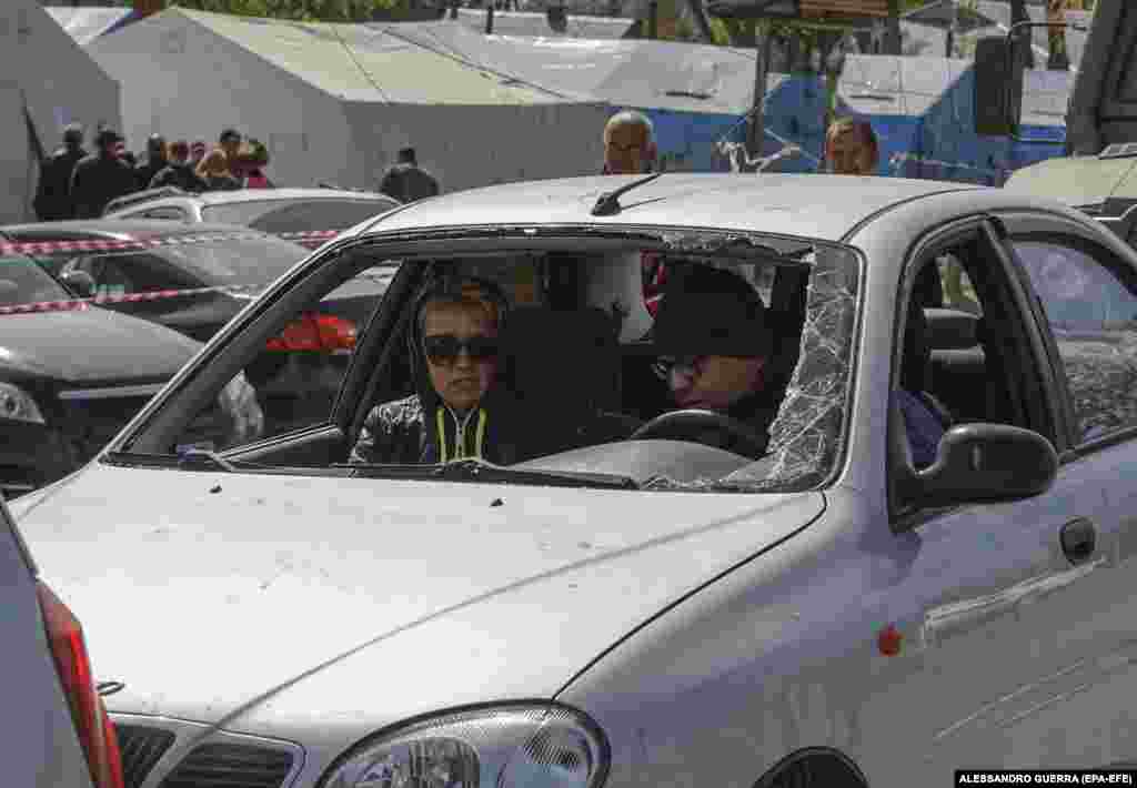 Civilians fleeing Mariupol wait at a checkpoint on May 7.&nbsp;The International Organization for Migration estimates that at least 7.1 million Ukrainians have been internally displaced since Russia launched its full-scale invasion on February 24.