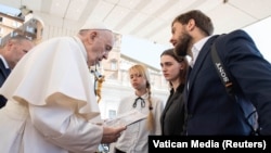 Pope Francis meets with wives of soldiers in Azov Regiment.