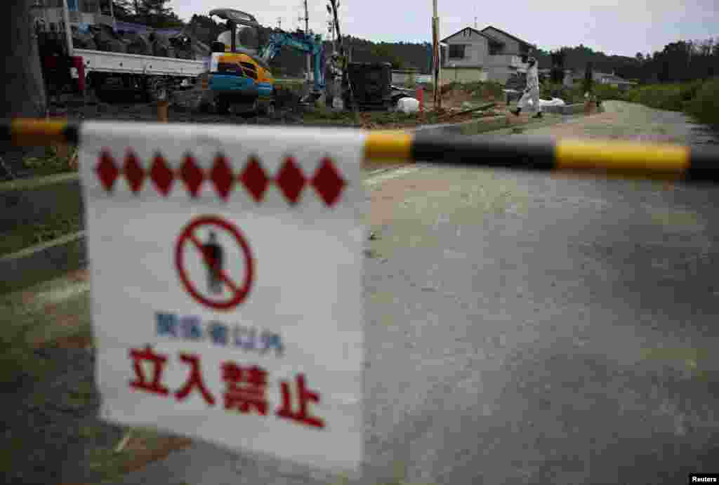 A no-entry sign in the town of Naraha, inside the 20-kilometer radius around the crippled plant that was temporarily a no-go zone.