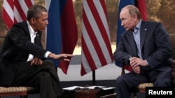 U.S. President Barack Obama (left) and his Russian counterpart Vladimir Putin at the G8 summit in Northern Ireland in 2013. 