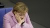 Меркель занепокоєна станом євро і закликає греків економити