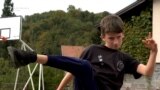 Srebrenica, Bosnia and Herzegovina -- Child from a local Kung Fu club training ahead of the world championship in Hungary