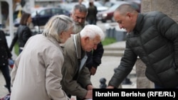 Residents in Gracanica, a majority-Serb municipality outside Kosovo's capital, sign a petition on local issues on October 3. 
