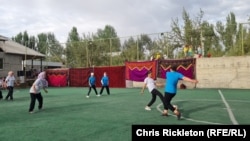 Women take part in the debut soccer tournament in Kok-Tash, Kyrgyzstan.