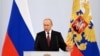 Vladimir Putin la ceremonia din 30 septembrie de semnarea a documentelor prin care Rusia revendică patru regiuni ucrainene. Anexarea nu este recunoscută de forurile internaționale.