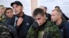 Russian recruits gather inside a military processing center in Bataisk, in southern Russia&#39;s Rostov-on-Don region on September 26. A recent Ukrainian counteroffensive swept Russian forces out of most of the Kharkiv region, with reports of heavy losses of soldiers and weapons.