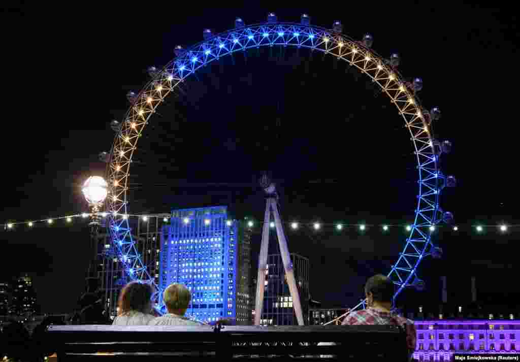 The London Eye is illuminated in yellow and blue to mark 30 years of Ukrainian independence on August 24.&nbsp;