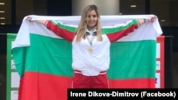 Irene Dikova celebrates with the Bulgarian flag after winning a gold medal at the European Heart and Lung Transplant Championships in 2018.