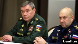 Russia's top military officer, General Valery Gerasimov (left), and General Sergei Surovikin (right), who was appointed by Putin to be Russia's overall commander for the invasion of Ukraine, are pictured in 2021.