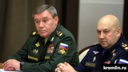 Valery Gerasimov (left) replaces Sergei Surovkin, who was appointed to the post three months ago. 