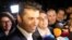 The party of former Prime Minister Kiril Petkov, shown talking to journalists after polling on October 2, came in second in the vote with 20.2 percent.