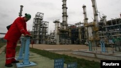 A man works at an oil refinery in Plock, Poland. (file photo)