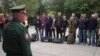 A Russian soldier addresses reservists during the partial mobilization of troops in the town of Volzhsky in Russia's Volgograd region on September 28.