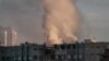 UKRAINE - Smoke rises from a partially destroyed building in Kyiv on October 17, 2022, amid the Russian invasion of Ukraine. Kyiv, 17OCT2022