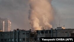 UKRAINE - Smoke rises from a partially destroyed building in Kyiv on October 17, 2022, amid the Russian invasion of Ukraine. Kyiv, 17OCT2022