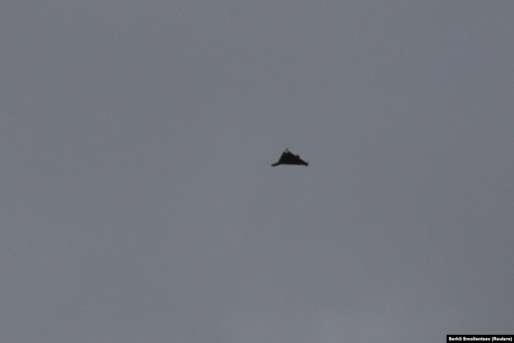 A drone believed to be a Shahed-136 is seen in the sky above Ukraine's southern port city of Odesa on September 23. Kyiv said that one civilian was killed during this attack and that an Iranian-designed UAV was successfully shot down. Kyiv stripped the Iranian ambassador of his accreditation and decided to reduce Iran's diplomatic presence in Ukraine to protest drone deliveries to Russia. "Supplying Russia with weapons to wage war against Ukraine is an unfriendly act that deals a serious blow to relations between Ukraine and Iran," Ukraine's Foreign Ministry said in a statement on September 23.