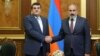 Armenian Prime Minister Nikol Pashinian (right) meets with Arayik Harutiunian in Yerevan in October 2022.