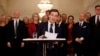 New Swedish Prime Minister Ulf Kristersson introduces the new government's ministers at a news conference in Stockholm on October 18.