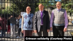 Jehovah's Witnesses" Volodymyr Maladyka (left), Yevhen Zhukov (center), and Volodymyr Sakada were each sentenced to six years in prison on October 6. 