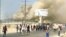 Petrochemical workers in Bushehr take part in an anti-government protest on October 10. 