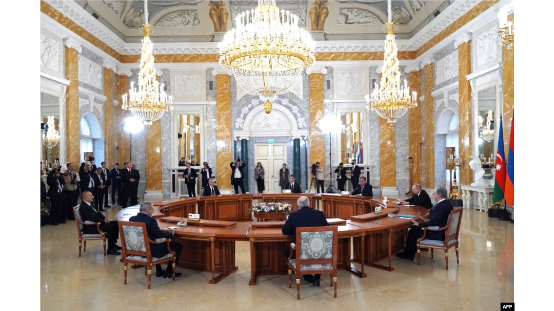 Kyrgyz President Sadyr Japarov was a no-show at a meeting with Russian President Vladimir Putin (second right) and other leaders in St. Petersburg on October 7.