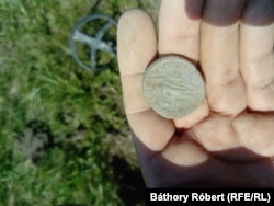 Experts have warned that treasure hunters are digging up coins and other artefacts at archaeological sites throughout Hungary.