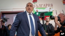 Former Bulgarian Prime Minister Boyko Borisov enters a polling station to cast his ballot in the town of Bankya on October 2.