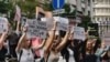 Serbia -- People and members of various NGO's protest before the office of the Serbian tabloid Informer, in Belgrade, October 1, 2022.