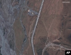 A Maxar satellite image shows a huge traffic jam near the Russia border with Georgia on September 25.