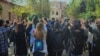 Female students of the art faculty at Tehran University protest without wearing the mandatory hijab on October 18.