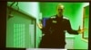 Aleksei Navalny appears on a video link from prison for his trial in Moscow in October 2022.