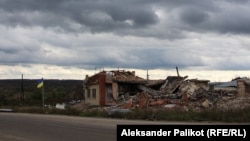 Разрушенный магазин Николая Мироненко в Долине на востоке Украины. 5 октября 2022 года