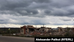 Dyqani i shkatërruar ushqimor i Mykola Myronenko. Dolina, lindje e Ukrainës, 5 tetor 2022.