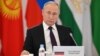 Russian President Vladimir Putin attends a CIS meeting in Astana on October 14.
