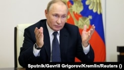 Владимир Путин малко, след като е подписал документите за анексирането на АЕЦ "Запорожие".