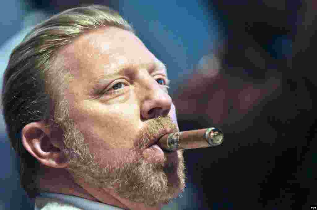 Cuba -- Former German tennis player Boris Becker smokes a cigar during the closing ceremony of the 15th Cuban Havana Cigar Festival in Havana, March 2, 2013