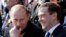 Dmitry Medvedev (right), president at the time, and then-Prime Minister Vladimir Putin enjoy a Victory Day military parade on Moscow's Red Square in 2008.