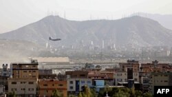 A military aircraft takes off from the military airport in Kabul on August 27.