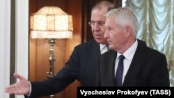 Russian Foreign Minister Sergei Lavrov welcomes Thorbjorn Jagland, secretary-general of the Council of Europe, during a meeting at the Russian Foreign Ministry in Moscow on October 20. The talks were described by Jagland's spokesman as "constructive."