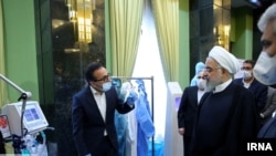 President Hassan Rouhani reviewing health products in Tehran. He never wears a protective mask in public. April 5, 2020