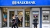 TURKEY -- People walk past a branch of Halkbank in Istanbul, December 1, 2017