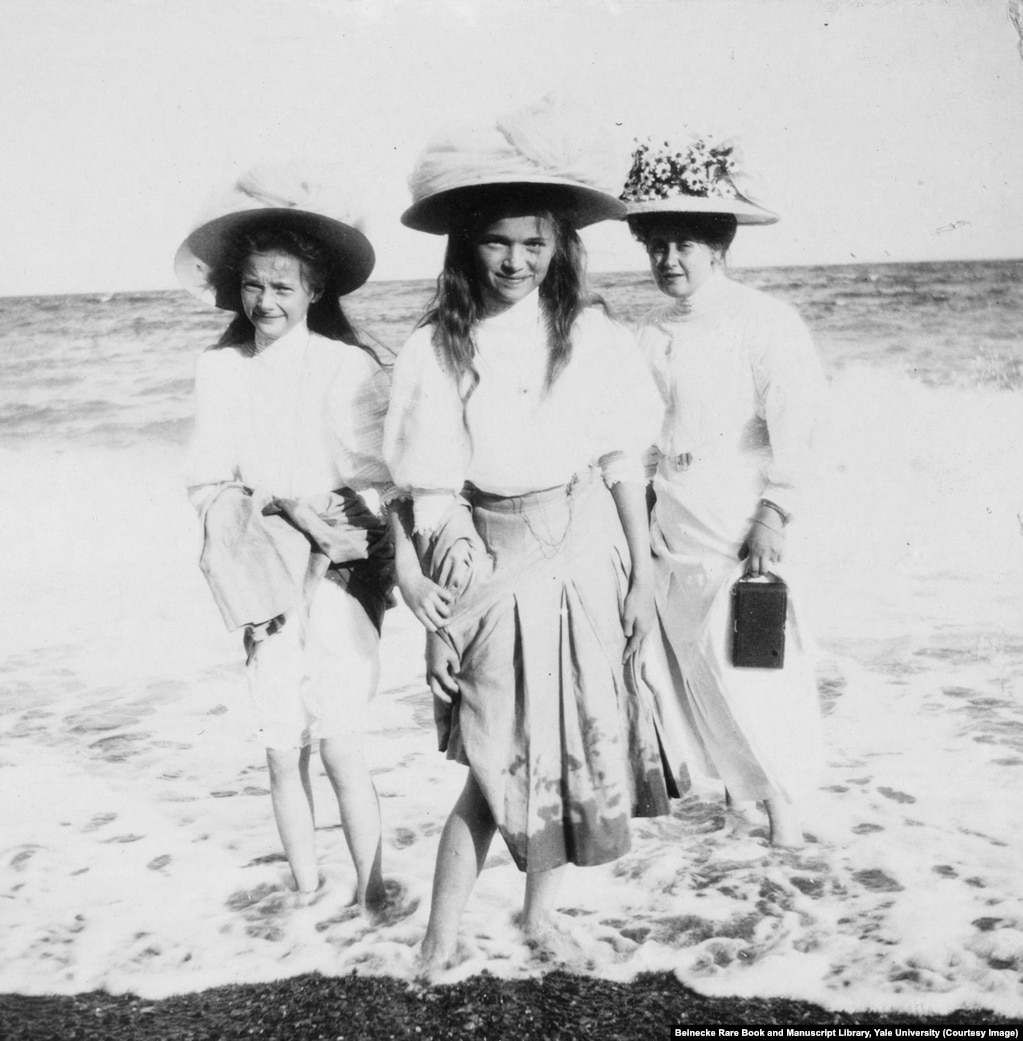 Anna Vyrubova (right) wading at the beach with Grand Duchesses Tatyana and Olga. After the family was murdered, Anna, a close friend of the royal family, was able to flee Soviet Russia with six albums containing these photographs.