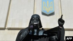 A man wearing the outfit of iconic "Star Wars" villain Darth Vader at a public appearance on behalf of the Ukrainian Internet Party (UIP).