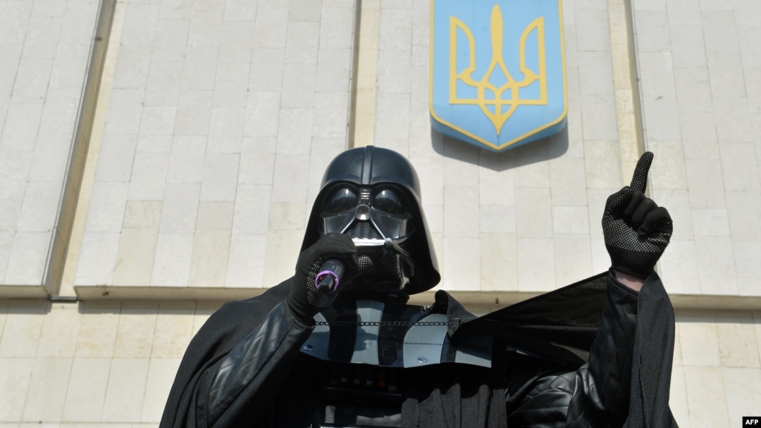 A man wearing the outfit of iconic "Star Wars" villain Darth Vader at a public appearance on behalf of the Ukrainian Internet Party (UIP).