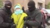 WATCH: Kazakh Police Detain Demonstrators Demanding Release Of Relatives In China